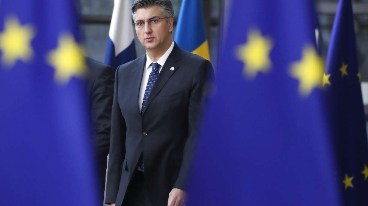 The Latest: EU gives UK leader May 2 Brexit deadlines