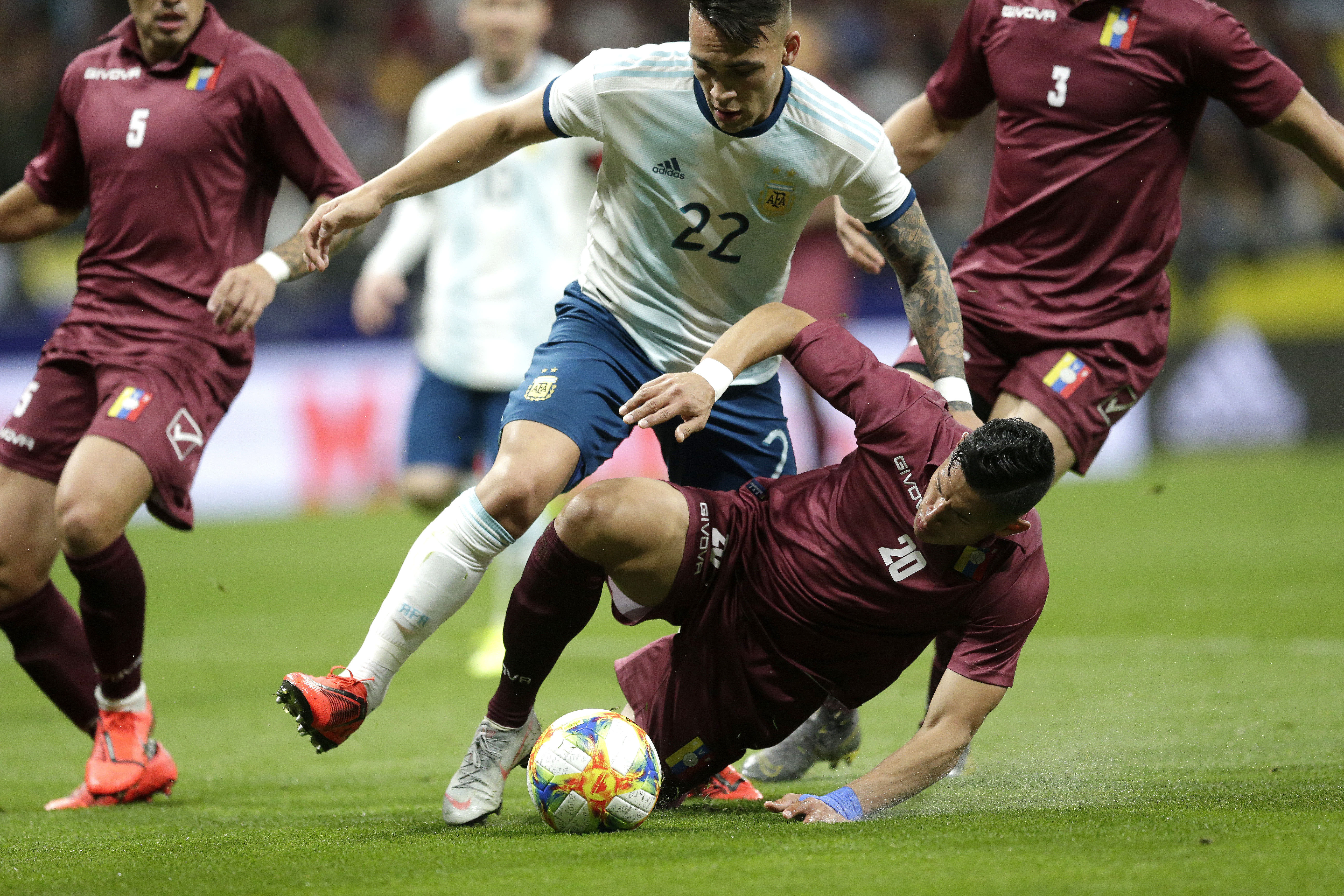 Venezuela beats Argentina 3-1 to spoil Messi's return