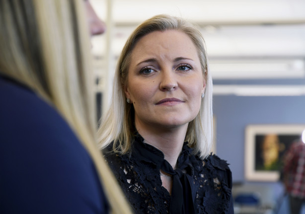 In this Saturday, March 23, 2019 photo, Columbine survivor Heather Martin reflects about the upcoming 20th anniversary of the mass shooting at her high school in suburban Denver. (AP Photo/Thomas Peipert)