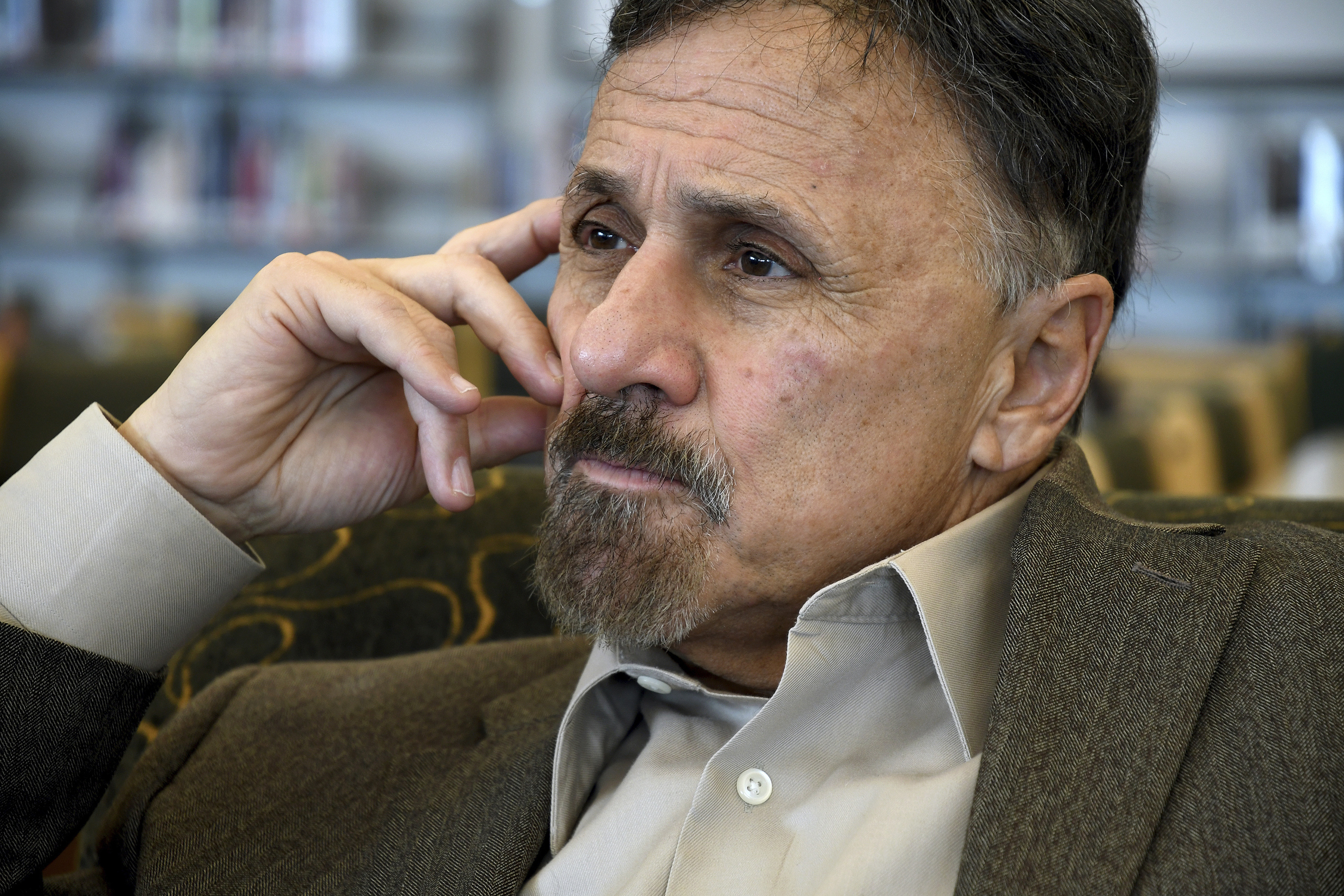 In this Saturday, March 23, 2019 photo, former Columbine principal Frank DeAngelis reflects about the upcoming 20th anniversary of the mass shooting at the suburban Denver high school. (AP Photo/Thomas Peipert)