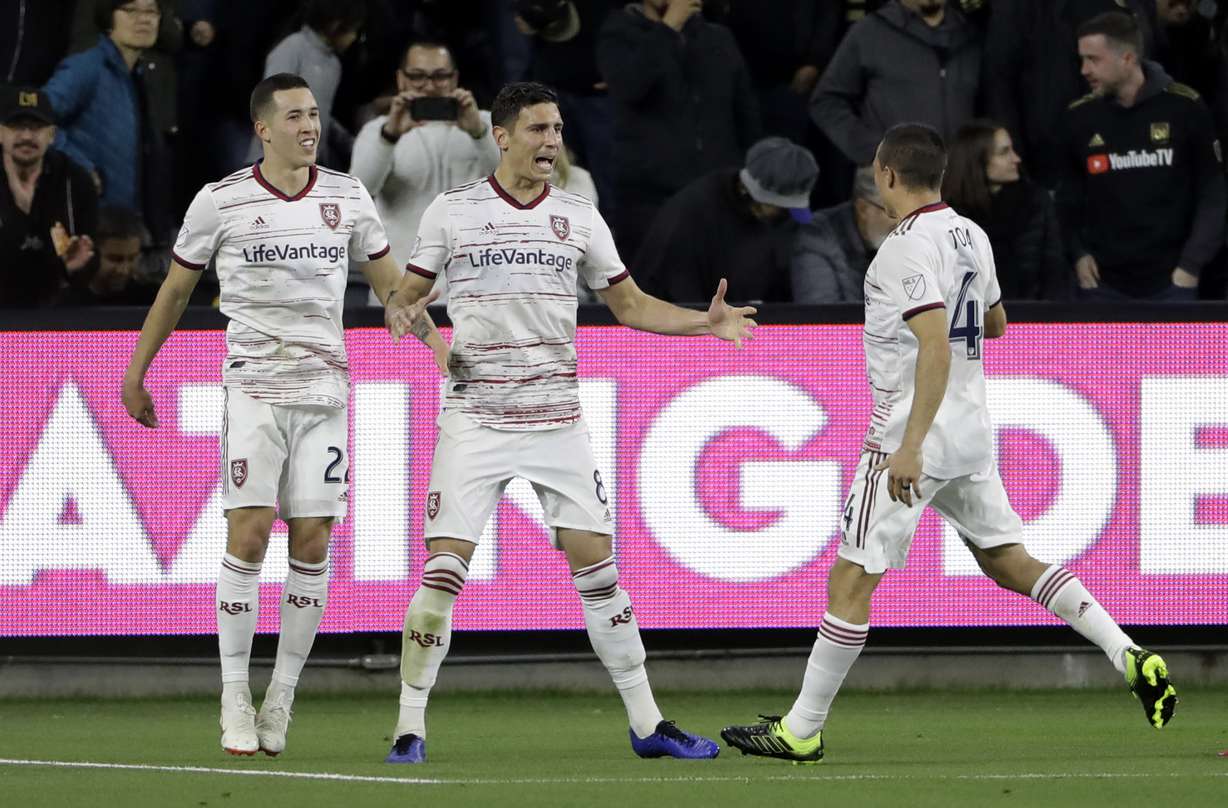 Real Salt Lake's Damir Kreilach, center, celebrates with teammates after scoring on a penalty kick against Los Angeles FC during the first half of an MLS soccer match Saturday, March 23, 2019, in Los Angeles. (Photo: Marcio Jose Sanchez, AP)
