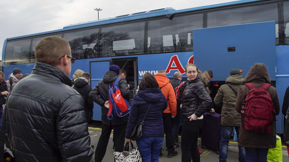 Ukrainian workers, seeing little hope at home, head abroad