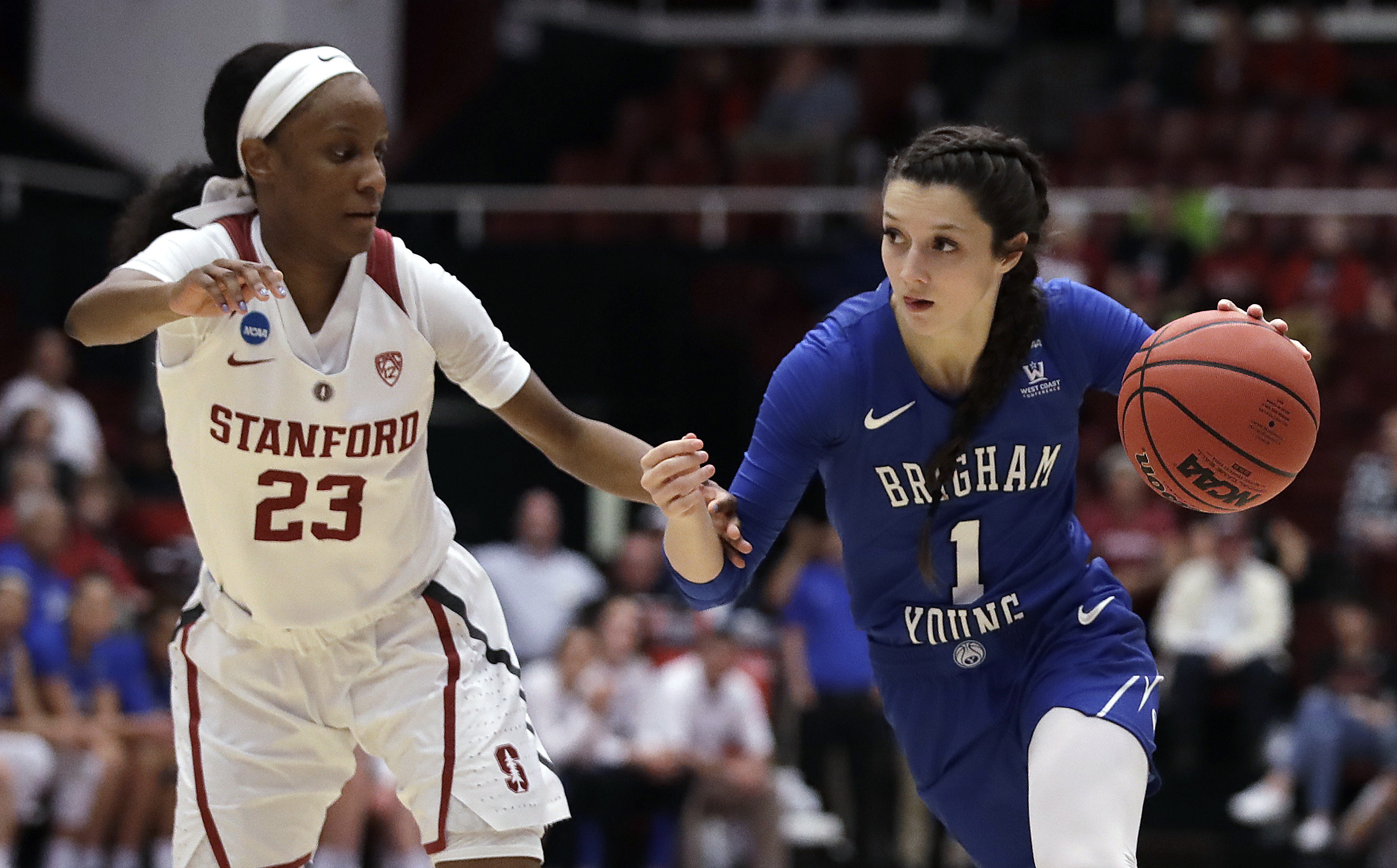 Stanford's Kiana Williams, left, guards BYU's Brenna Chase during the first half of a second-round game in the NCAA women's college basketball tournament Monday, March 25, 2019, in Stanford, Calif. (Photo: Ben Margot, AP)