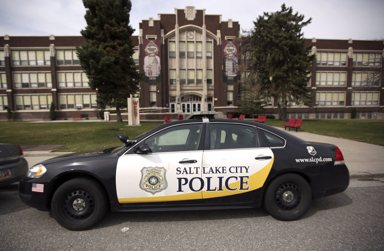 A Salt Lake City police car is parked outside of West High School in Salt Lake City on Tuesday, March 26, 2019. City and police officials signed a new agreement with the Salt Lake City School District that aims to improve the role of school resource officers on campuses. Photo: Kristin Murphy, KSL