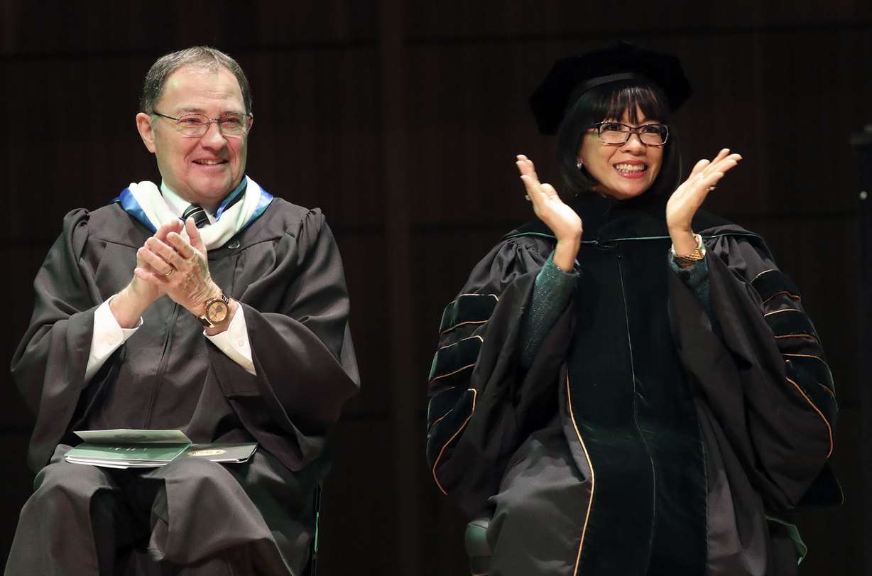 Gov. Gary Herbert and Astrid S. Tuminez, Utah Valley University’s seventh president, applaud during the inauguration ceremony for Tuminez at the UVU Noorda Center for the Performing Arts in Orem on Wednesday, March 27, 2019. (Photo: Kristin Murphy, KSL)