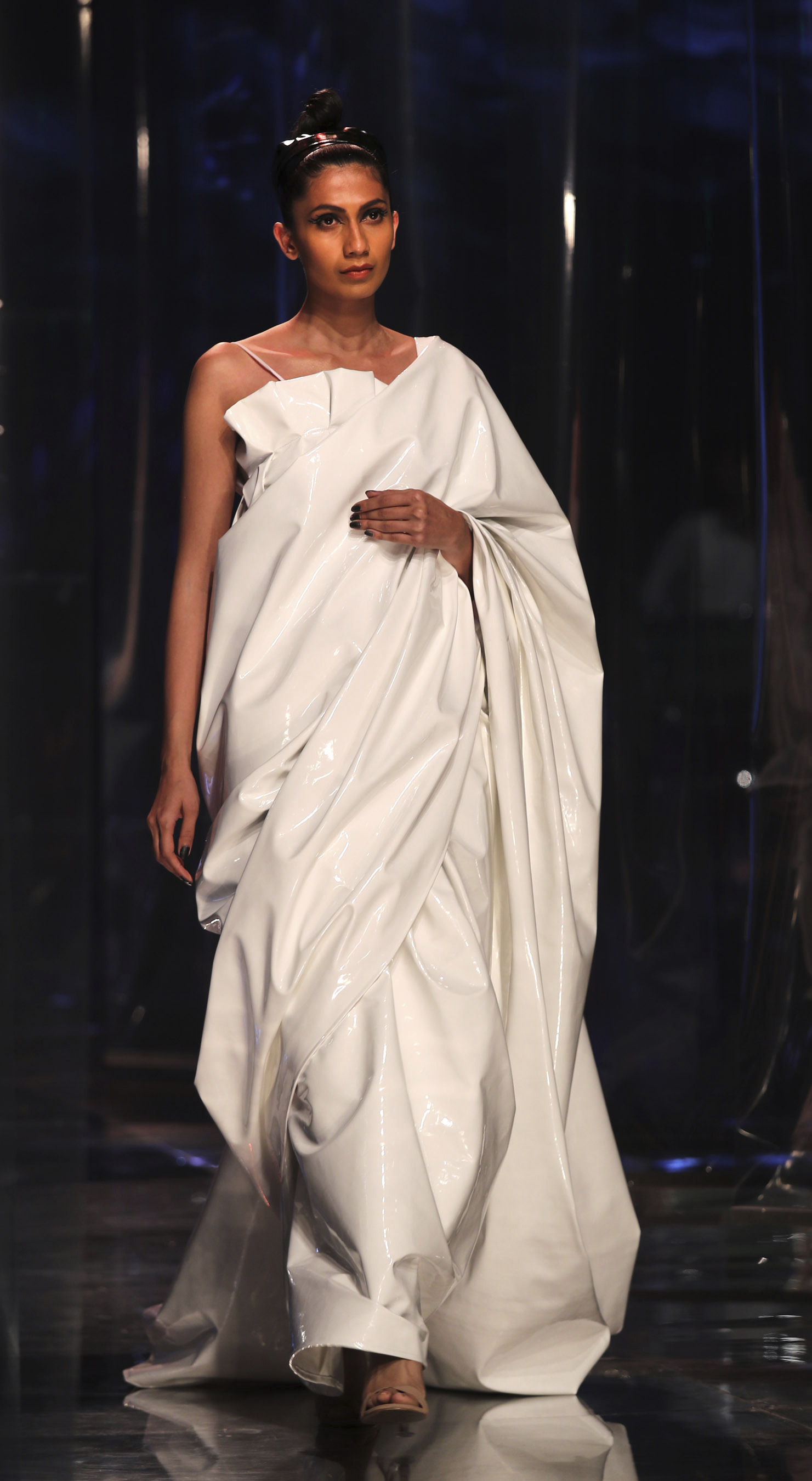 AP Photos: Saris stand out on Indian fashion runway