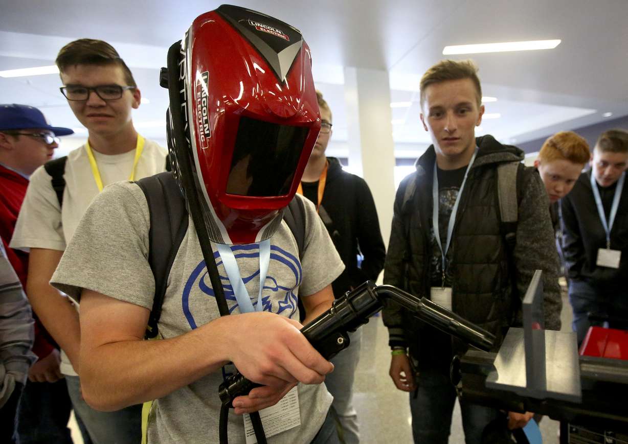 Fremont High School senior Eric Merkley uses a virtual welder training device during Design Build Day at the Weber State University Davis campus in Layton on Thursday, March 28, 2019. Photo: Kristin Murphy, KSL