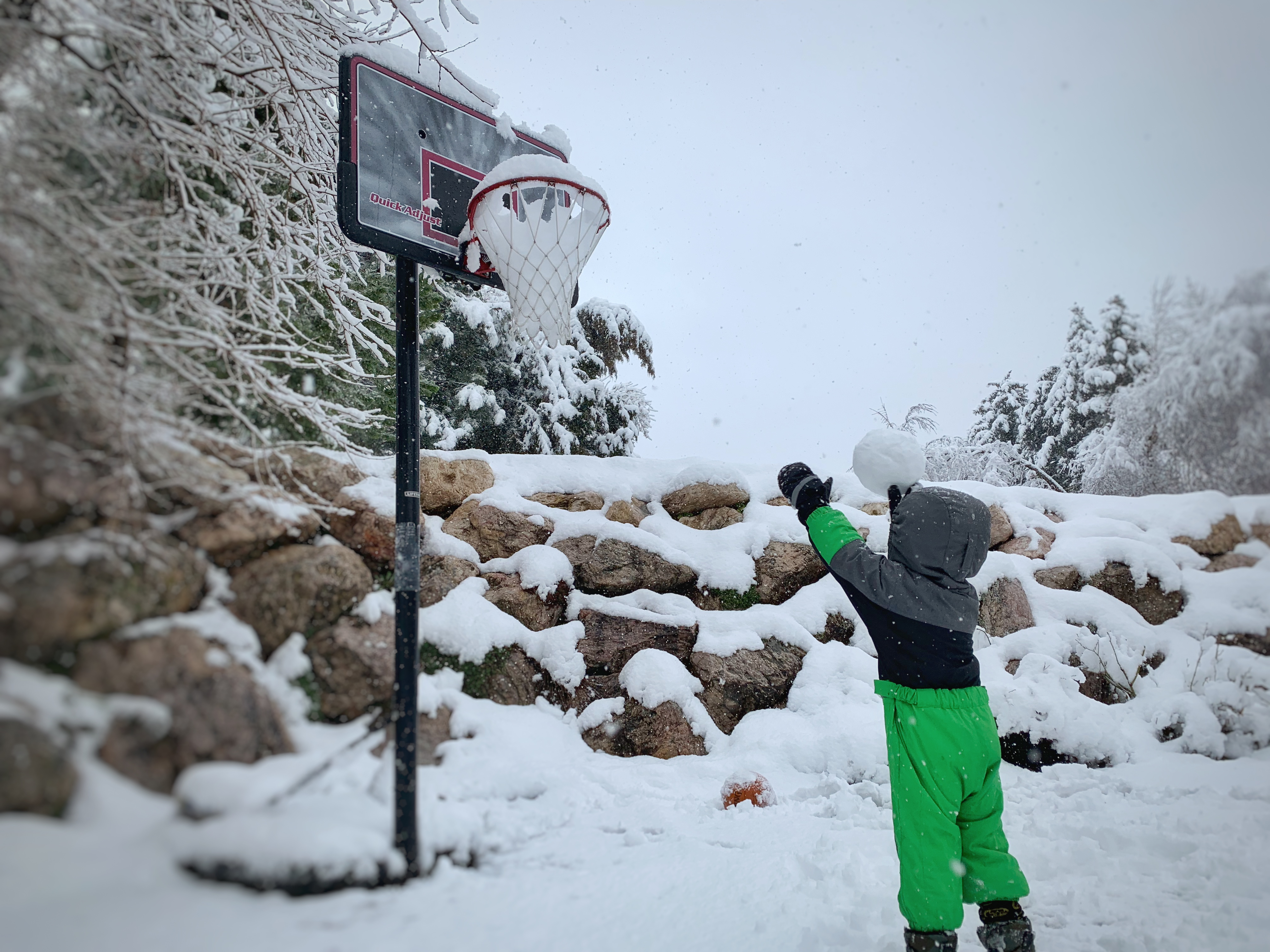 March Madness: Addax, 3, shooting a snow basketball after a snowstorm in Utah on Friday, March 29, 2019. (Photo: Jeff Twede)