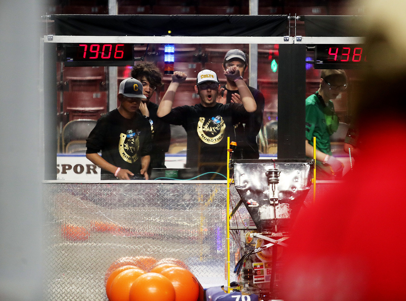 Abdul Ayubi celebrates at the end of a competition as students from Cottonwood High School work to compete in the First Robotics Competition Utah Regional event at the Maverik Center in West Valley City, Utah, on Friday, March 29, 2019. (Photo: Scott G Winterton, KSL)
