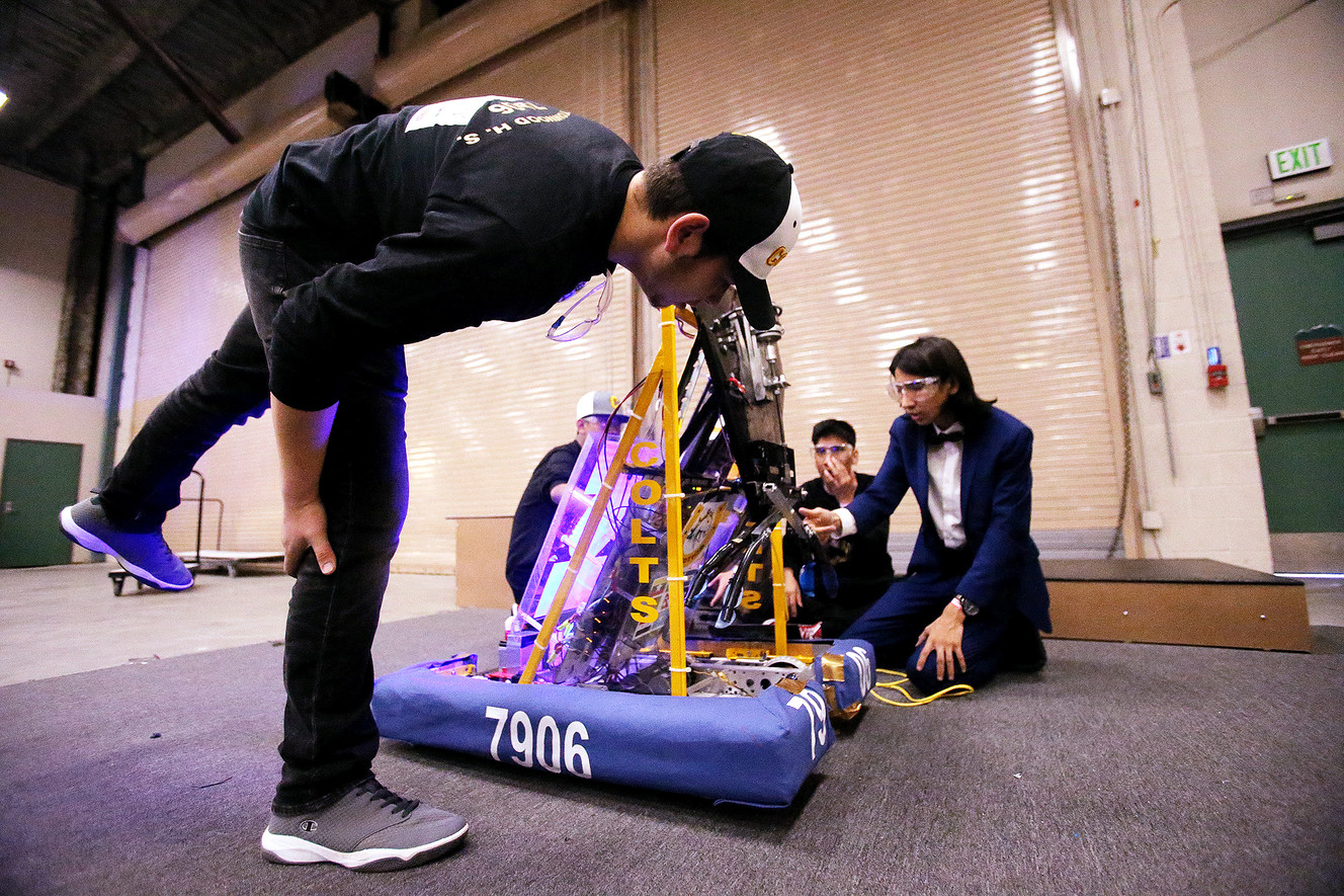 Abdul Ayubi takes a look in front at the robot during practice as students from Cottonwood High School work to compete in the First Robotics Competition Utah Regional event at the Maverik Center in West Valley City, Utah, on Friday, March 29, 2019. (Photo: Scott G Winterton, KSL)