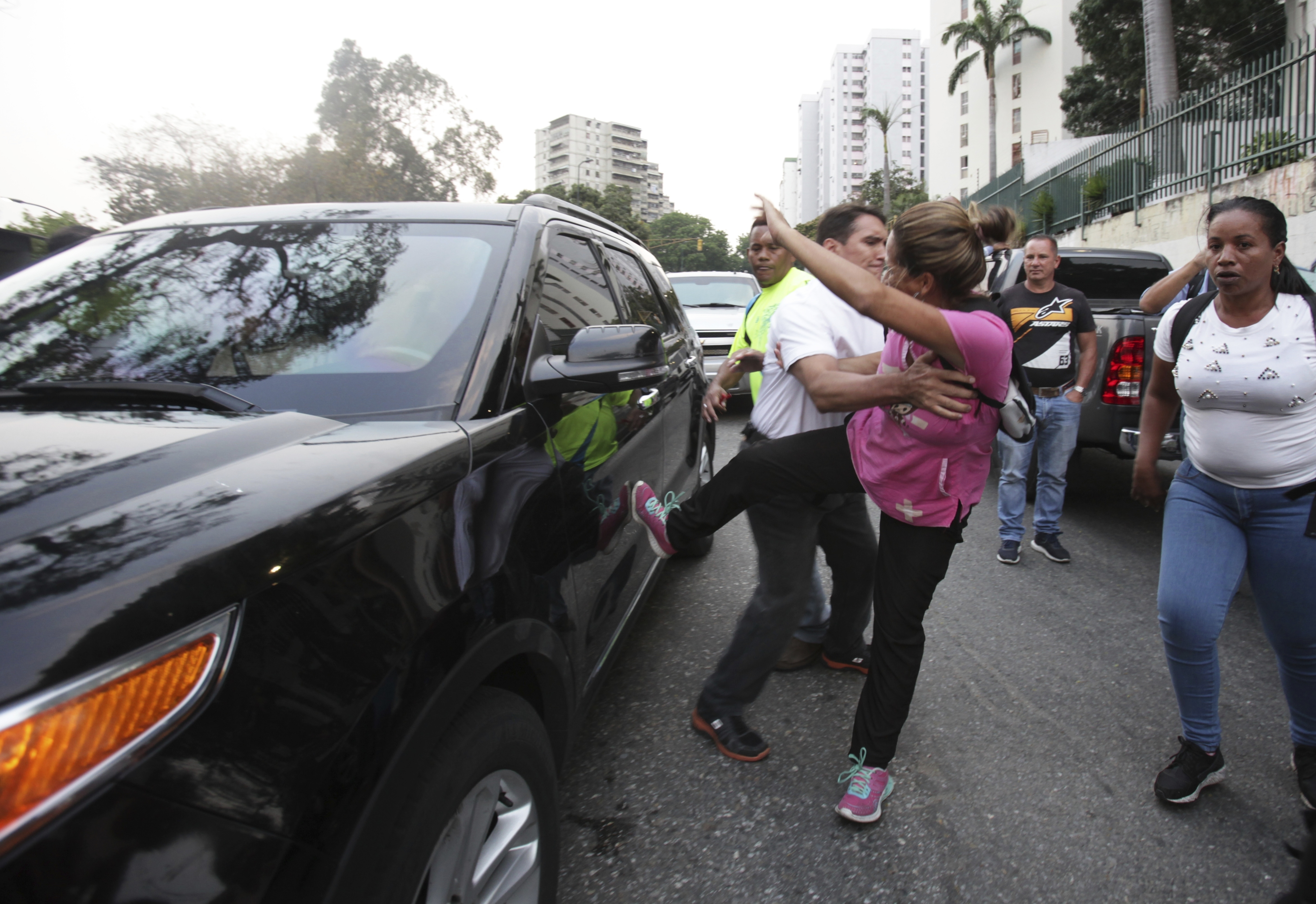 Venezuela's rival factions rally as power struggle persists