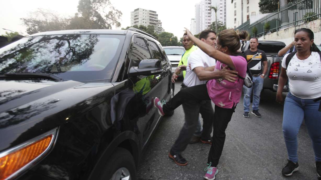 Venezuela's rival factions rally as power struggle persists