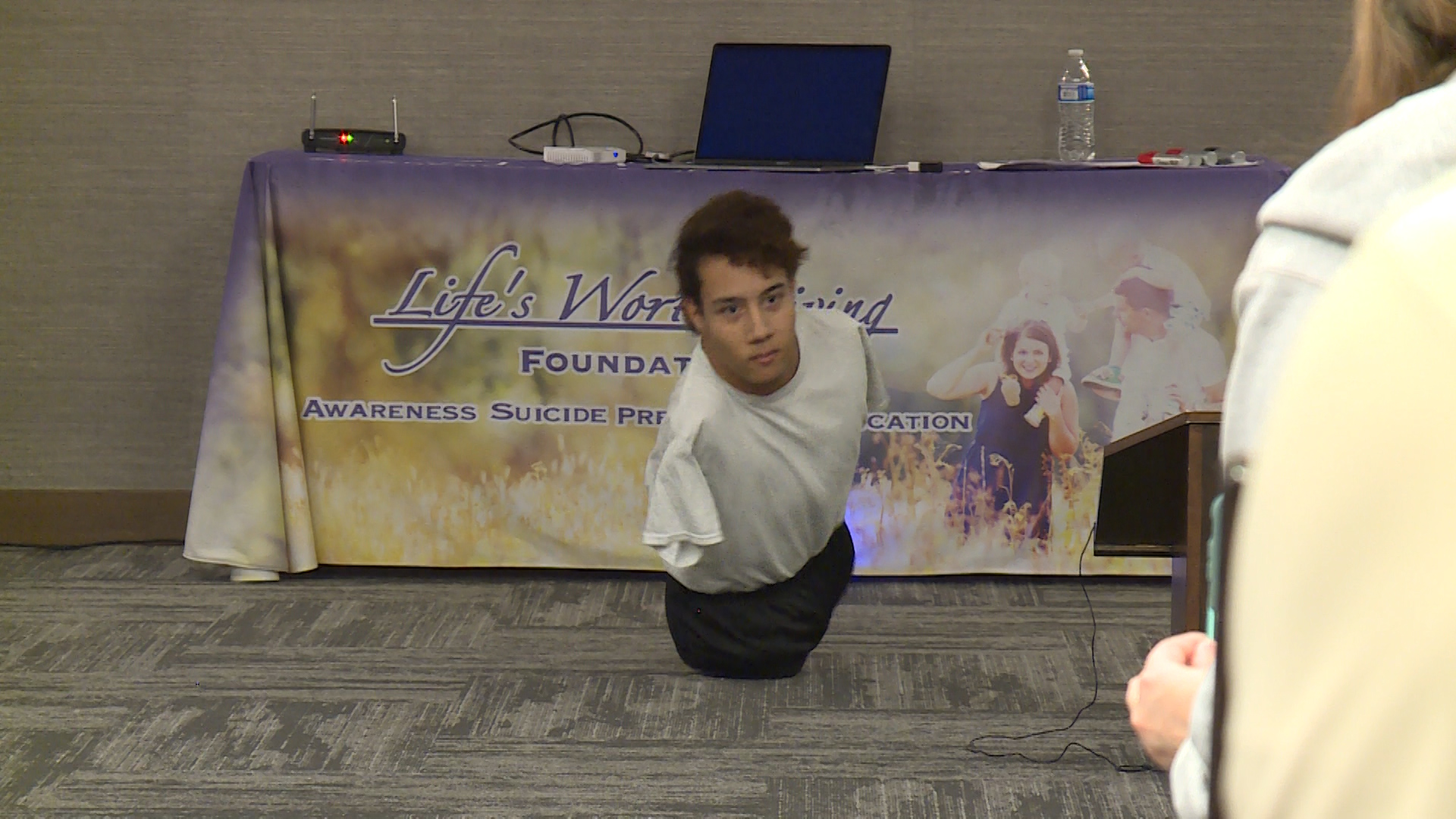 Gabe Adams dances in front of a crowd that gathered in Utah recently to hear him speak. The Layton man has Hanhart syndrome and was born without limbs, but he doesn't let anything slow him down. (Photo: Adam Sotelo, KSL TV)