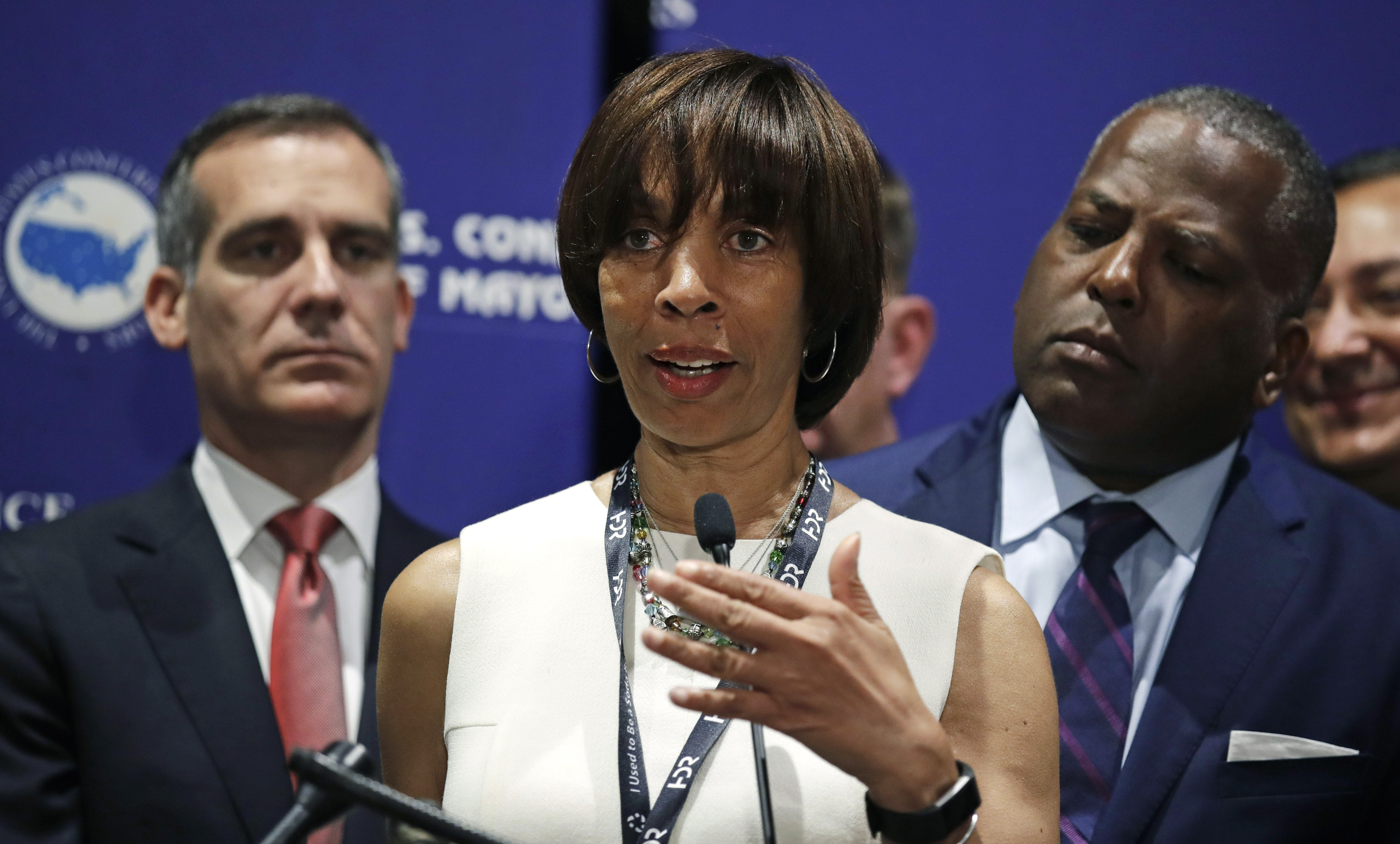 Baltimore mayor goes on leave as book scandal intensifies