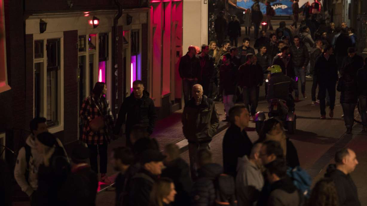 Amsterdam sex workers angry at red light district tours ban