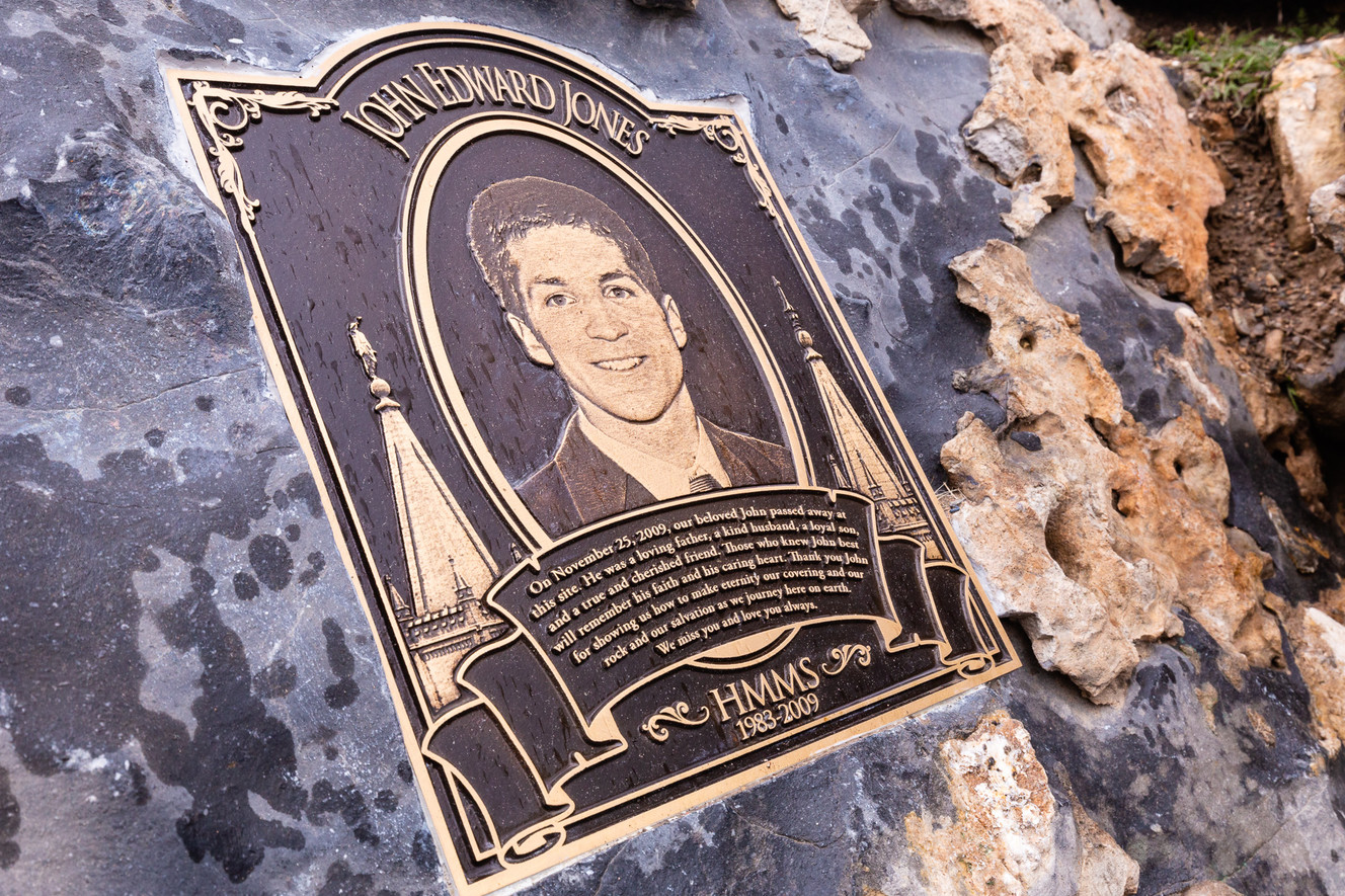 A memorial plaque located near the former entrance to Nutty Putty Cave, placed in remembrance of John Jones. (Photo: Dave Cawley, KSL Newsradio)