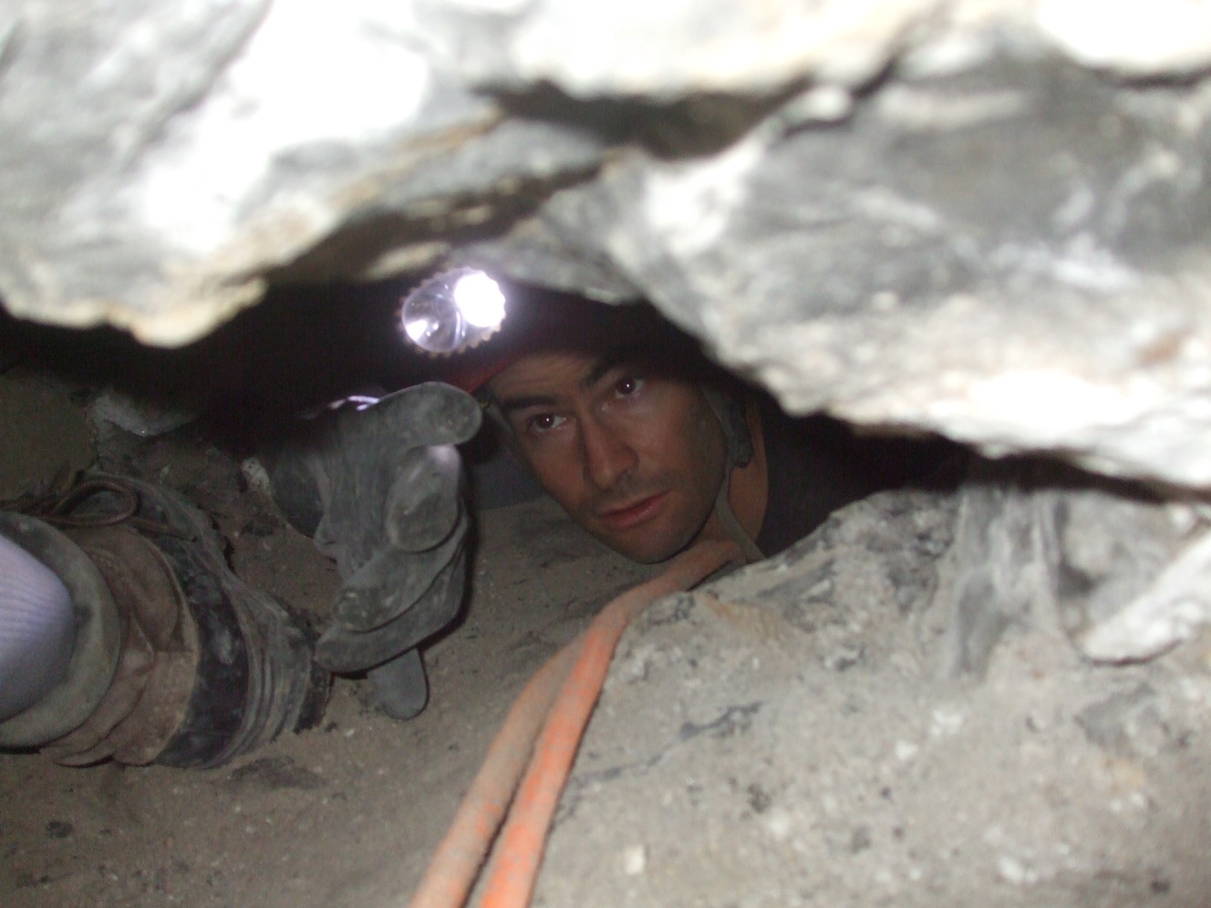 A rescuer working near John Jones in the Nutty Putty Cave on Nov. 26, 2009. Jones died after being trapped for 27 hours. (Photo: Utah County Sheriff Department)