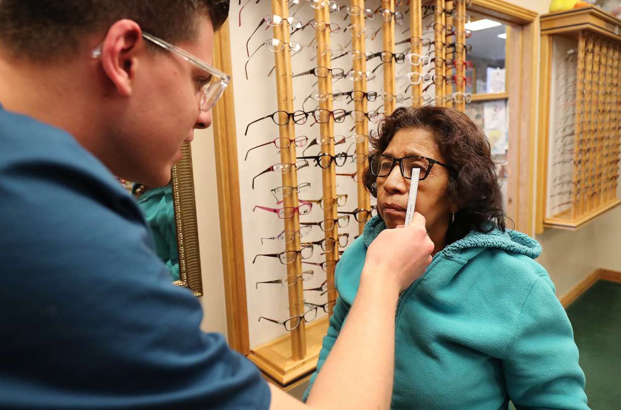 Andrew Perks checks Adelita Bivino's bifocals at Eye Care 4 Kids in Sandy on Wednesday, April 3, 2019. (Photo: Jeffrey D. Allred, KSL)