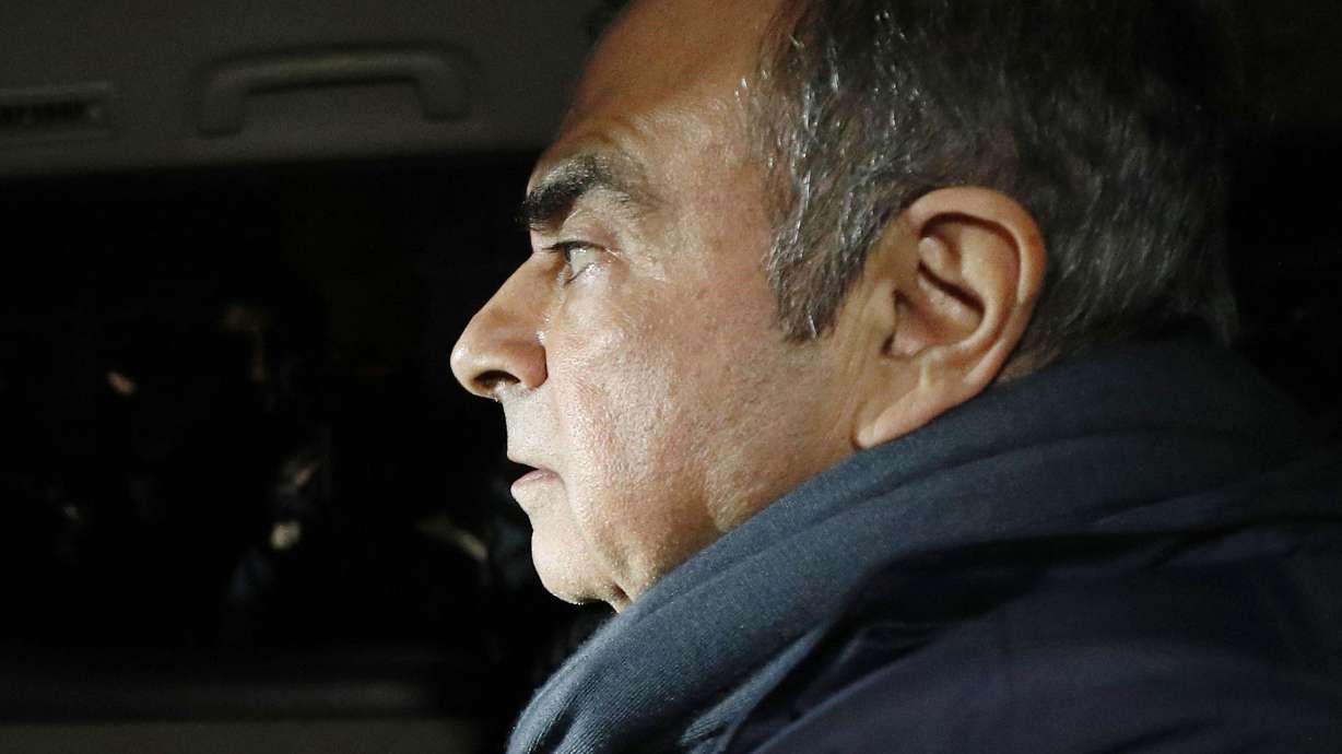 The Latest: Ghosn predicted arrest in French TV interview