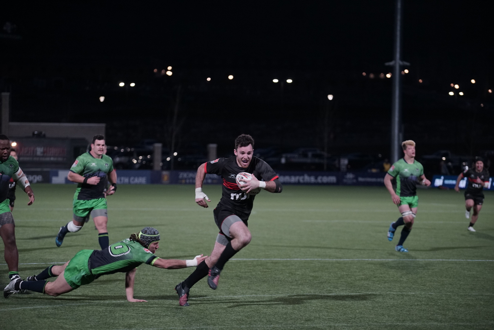 Utah Warriors flyhalf Tim O'Malley runs for a try against Seattle, Friday, April 5, 2019 at Zions Bank Stadium in Herriman. (Photo: David Boyd, Utah Warriors)