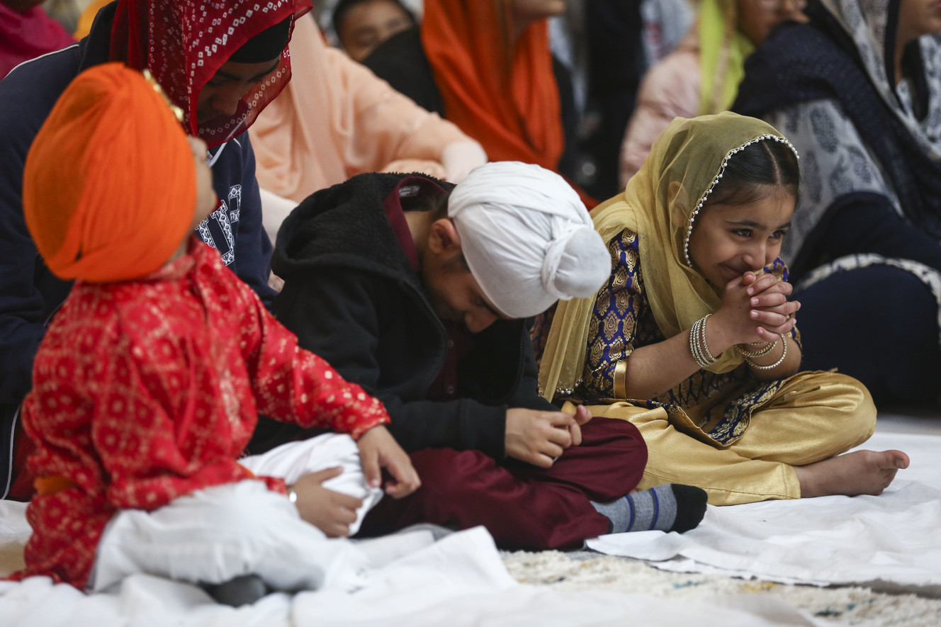 Children smile and bow during the celebration of the Sikh festival of Vaisakhi at the state Capitol in Salt Lake City on Saturday, April 6, 2019. (Photo: Silas Walker, KSL)