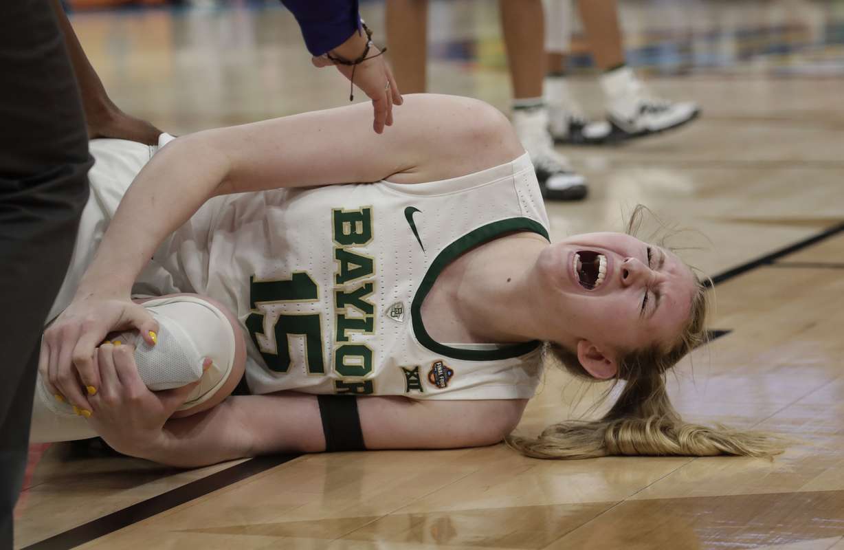 Baylor forward Lauren Cox yells as she holds her left knee, during the second half against Notre Dame in the Final Four championship game of the NCAA women's college basketball tournament Sunday, April 7, 2019, in Tampa, Fla. (Photo: John Raoux, AP)