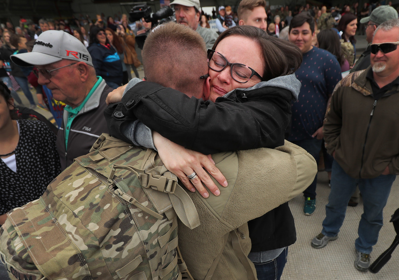 Cristie Malcom hugs son Ethan Malcom as the Utah Army National Guard’s Echo Battery, 1st Battalion, 145th Field Artillery, “Big Red,” arrives at Roland R. Wright Air Base in Salt Lake City on Tuesday, April 9, 2019, following a deployment in the Middle East. (Photo: Jeffrey D. Allred, KSL)