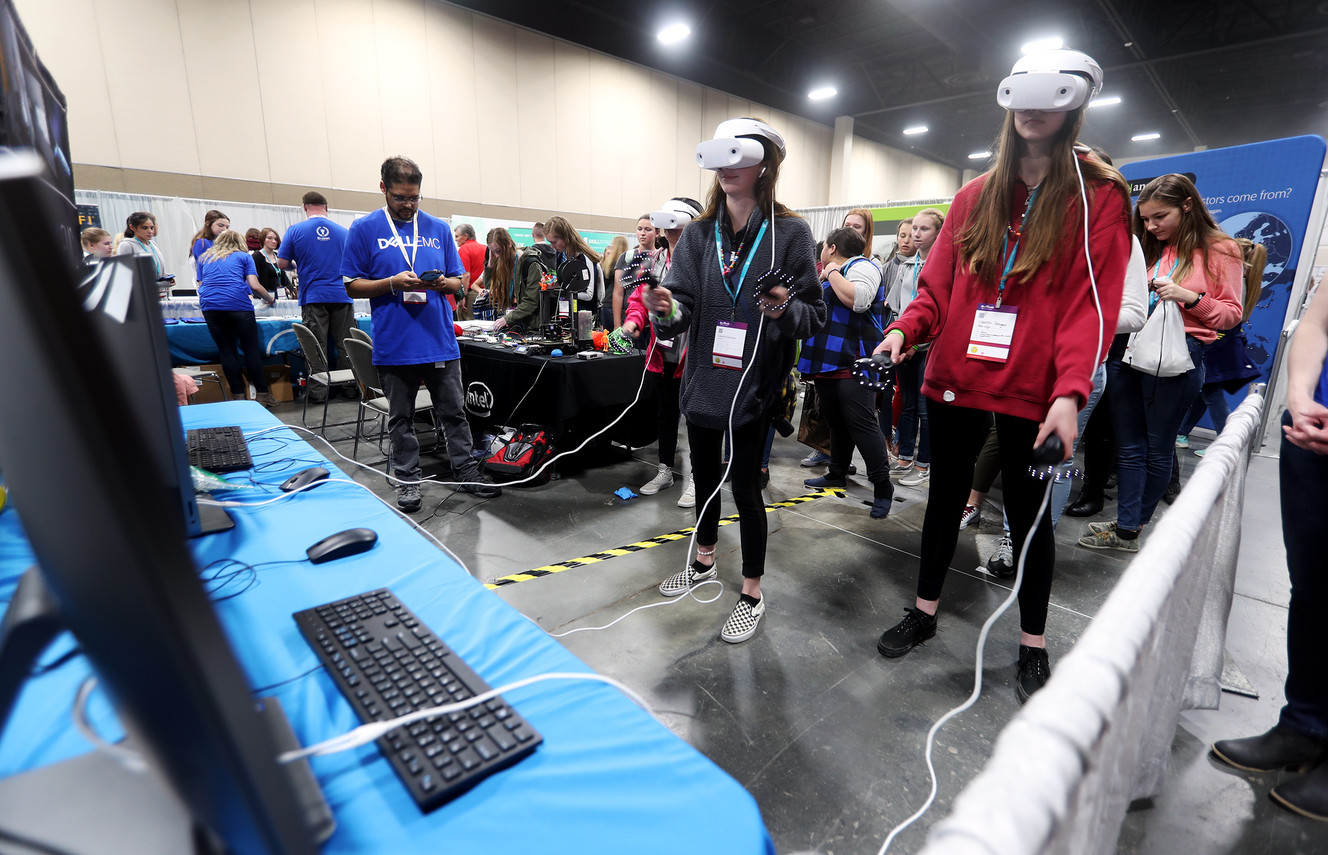 Liberty Gardner and Lauren Dragas play video games during SheTech Explorer Day at the a Mountain America Exposition Center in Sandy on Tuesday, April 9, 2019. Photo: Scott G Winterton, KSL