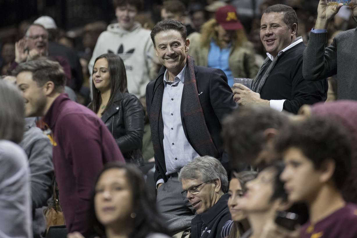 Former Louisville head coach Rick Pitino smiles as he watches the game action during the first half of an NCAA college basketball game between Alabama and Minnesota, Saturday, Nov. 25, 2017, in New York. (Photo: Mary Altaffer, AP)