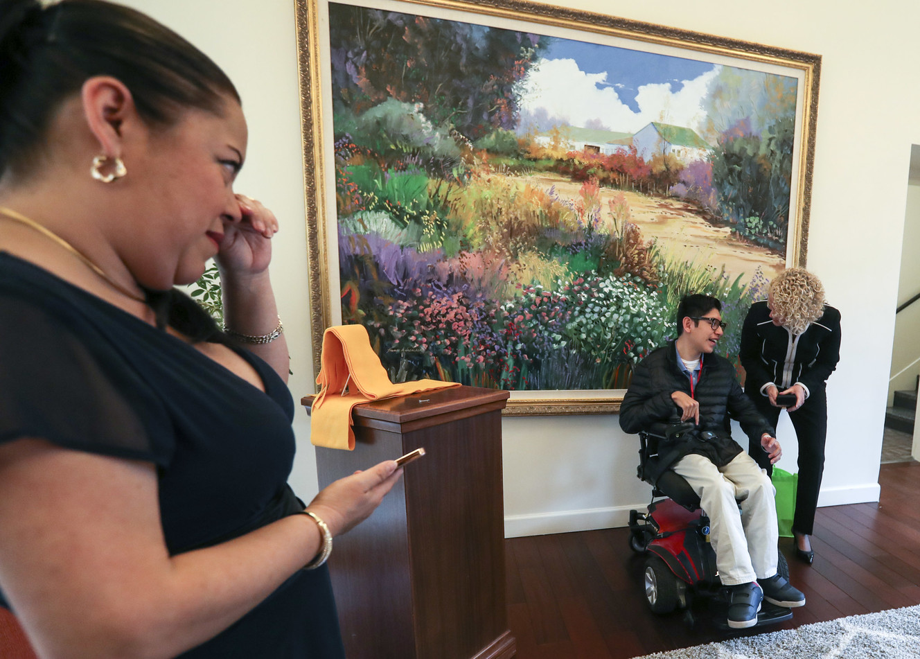 Ivonne Quiroz wipes tears from her eyes as Salt Lake City Mayor Jackie Biskupski gives her son, Edgar Perez, a key to the city as she recognizes Perez as the honorary mayor of Ronald McDonald House at the Salt Lake facility on Wednesday, April 10, 2019. Perez and his family have become a fixture at the house and he is lovingly referred to as the “mayor of the house.” Perez knows everyone and often is in the halls greeting people and making sure everything is running smoothly. (Photo: Steve Griffin, KSL)