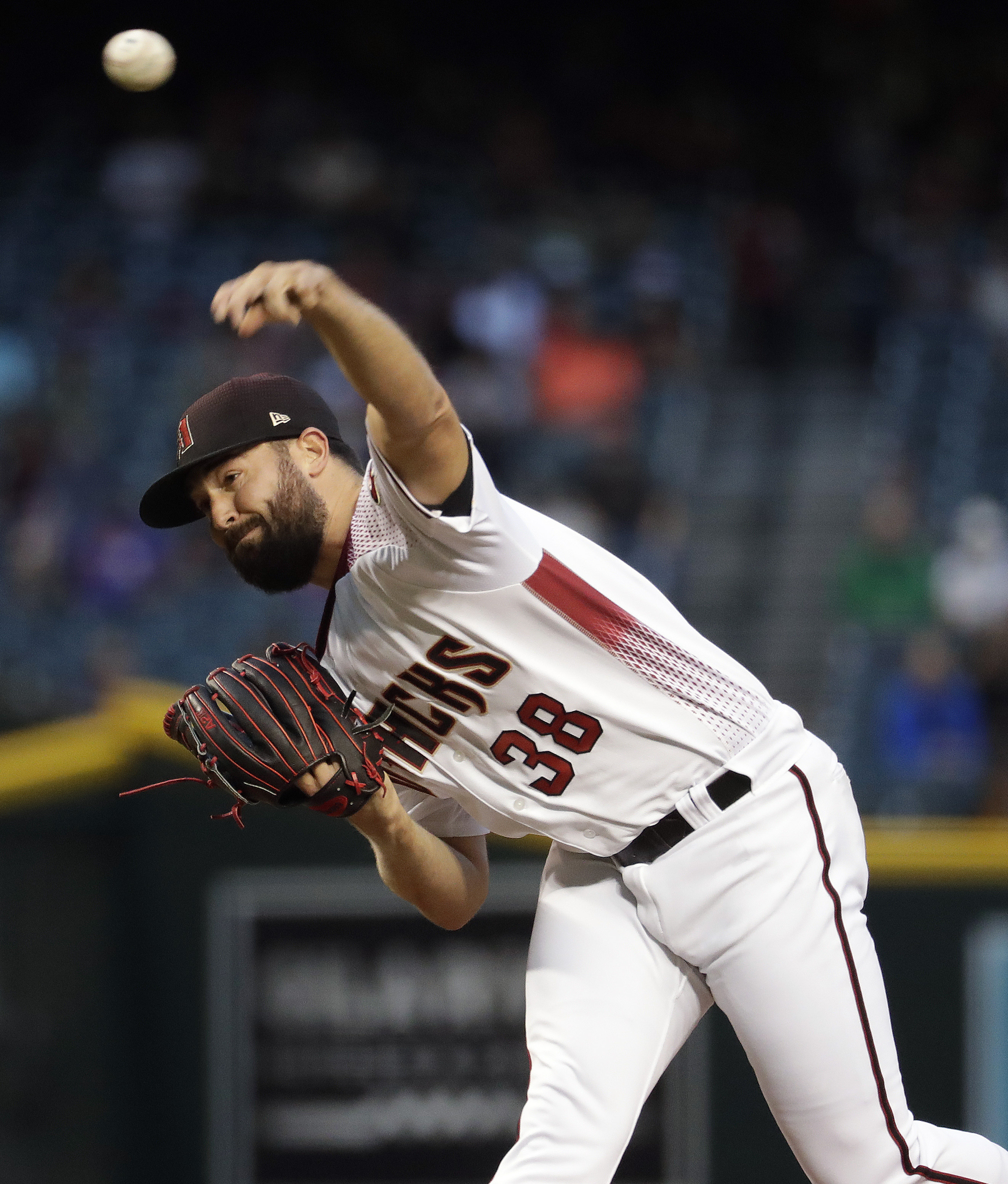 Lynn, late offense help Rangers end losing skid