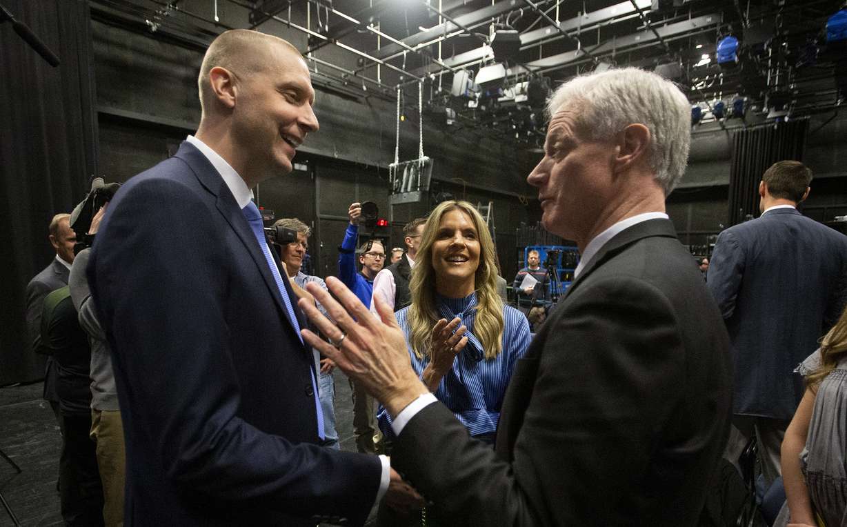 New men's head basketball coach Mark Pope and his wife wife Lee Anne talk with BYU President Kevin J Worthen, after a press conference at the BYU Broadcast building in Provo on Wednesday, April 10, 2019. (Photo: Scott G Winterton, KSL)