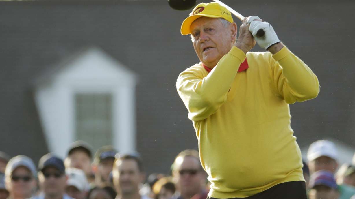 The Latest: Koepka, DeChambeau scorch back nine, share lead