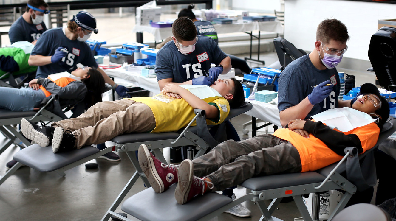 Children get their teeth cleaned at Vivint Smart Home Arena in Salt Lake City on Thursday, April 11, 2019. The Utah Jazz and TeamSmile partnered to provide complimentary dental care for underprivileged students. Since the Jazz and TeamSmile began working together in 2015, the volunteer dentists and dental hygienists have performed $300,000 worth of dental work — including cleanings, fillings, sealants and extractions — at no charge. (Photo: Laura Seitz, KSL)