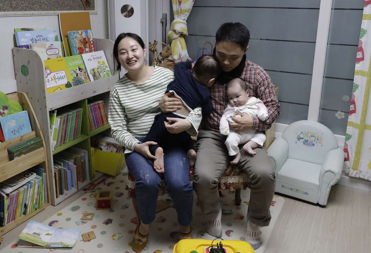 In this March 25, 2019 photo, a South Korean woman Seo Hyo Sun, left, speaks during an interview at her home in Buchon, South Korea. (AP Photo/Lee Jin-man)