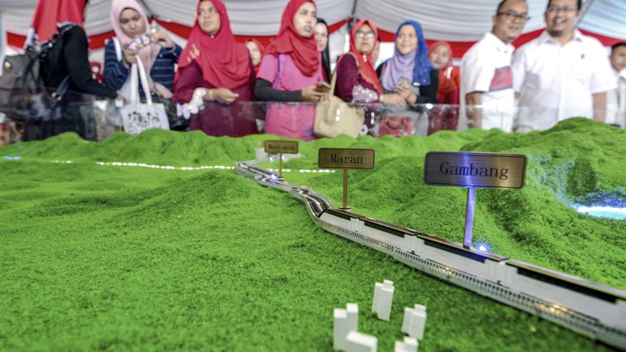 Malaysia revives China-backed rail link, cost cut by a third