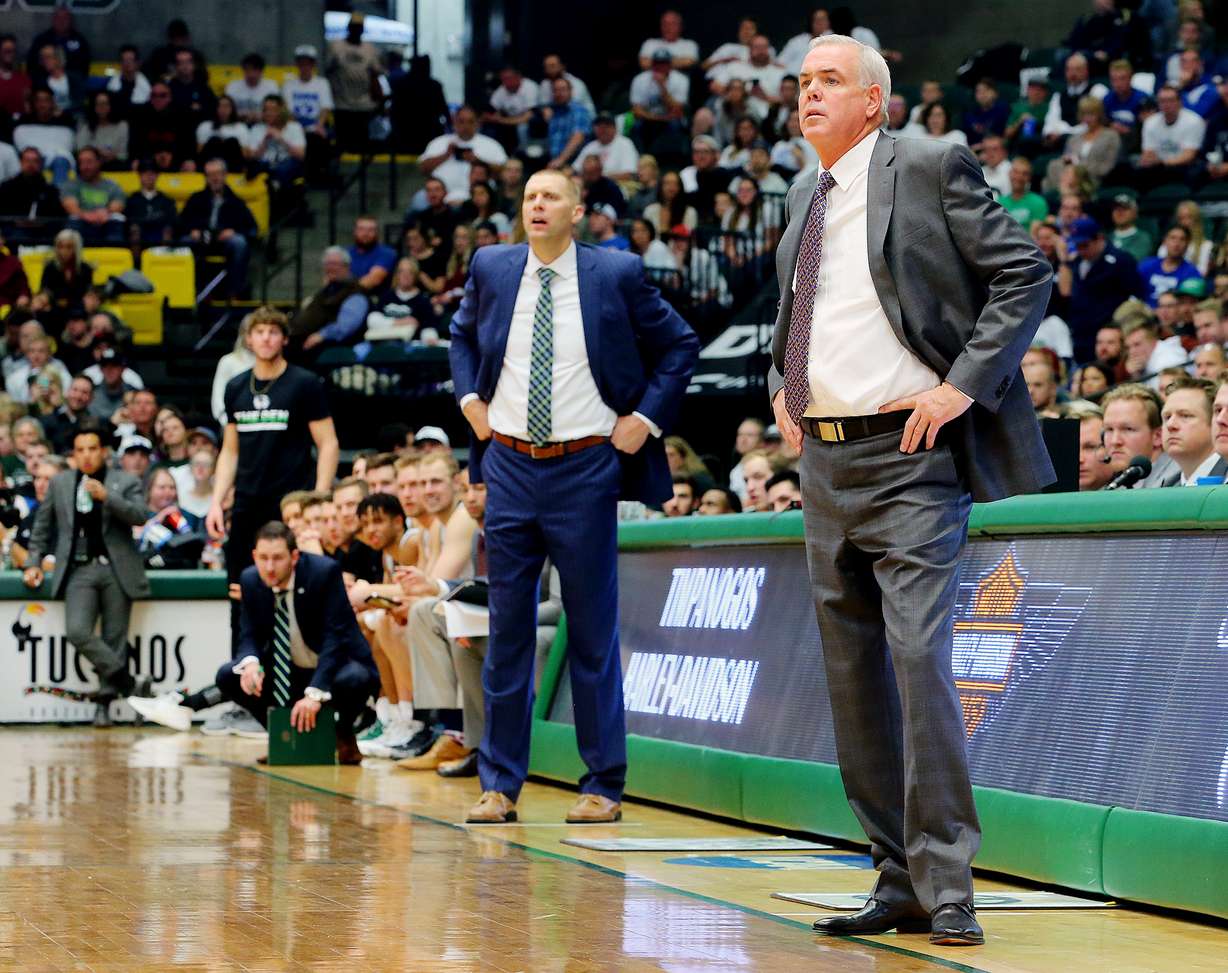 Utah Valley Wolverines head coach Mark Pope and Brigham Young Cougars head coach Dave Rose watch from the sideline as UVU and BYU play a College basketball game in the UCCU center at UVU in Orem Utah on Wednesday, Nov. 29, 2017. BYU won 85-58. (Photo: Scott G Winterton, Deseret News)