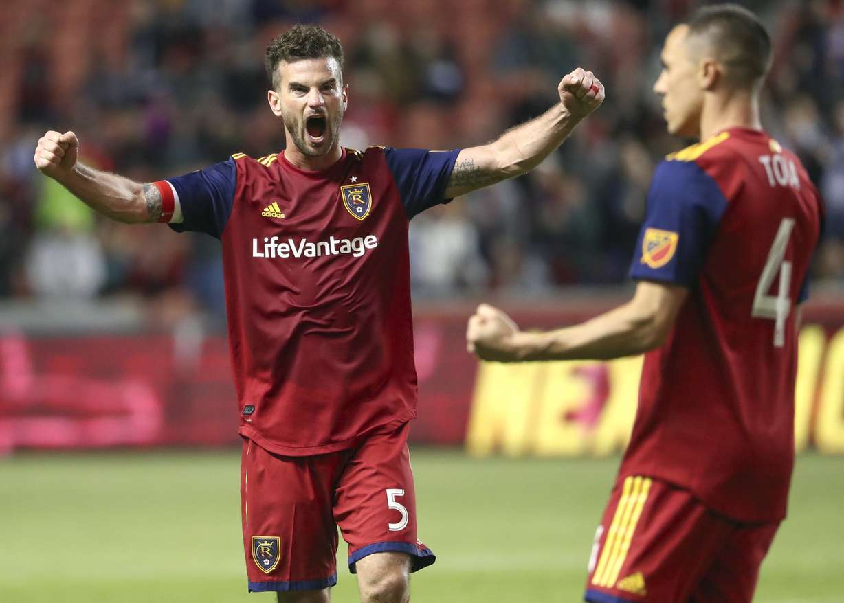Real Salt Lake midfielder Kyle Beckerman (5) and Real Salt Lake defender Donny Toia (4) celebrate after RSL defeated Orlando City 2-1 at Rio Tinto Stadium in Sandy on Saturday, April 13, 2019. (Photo: Steve Griffin, KSL)