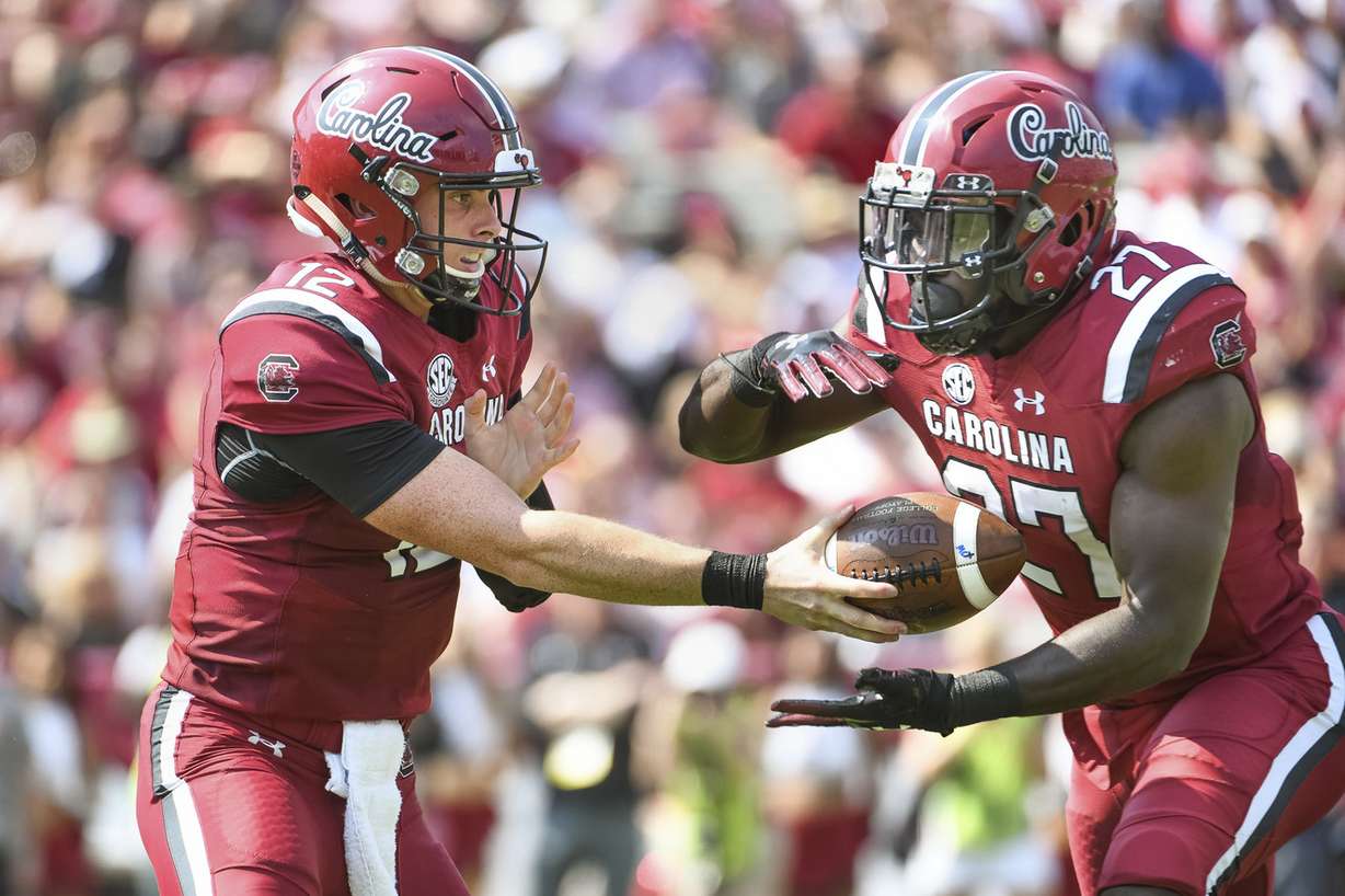 South Carolina quarterback Michael Scarnecchia (12) hands off to Ty'Son Williams (27) during the first half of an NCAA college football game against Missouri Saturday, Oct. 6, 2018, in Columbia, S.C. (Photo: Sean Rayford, AP)