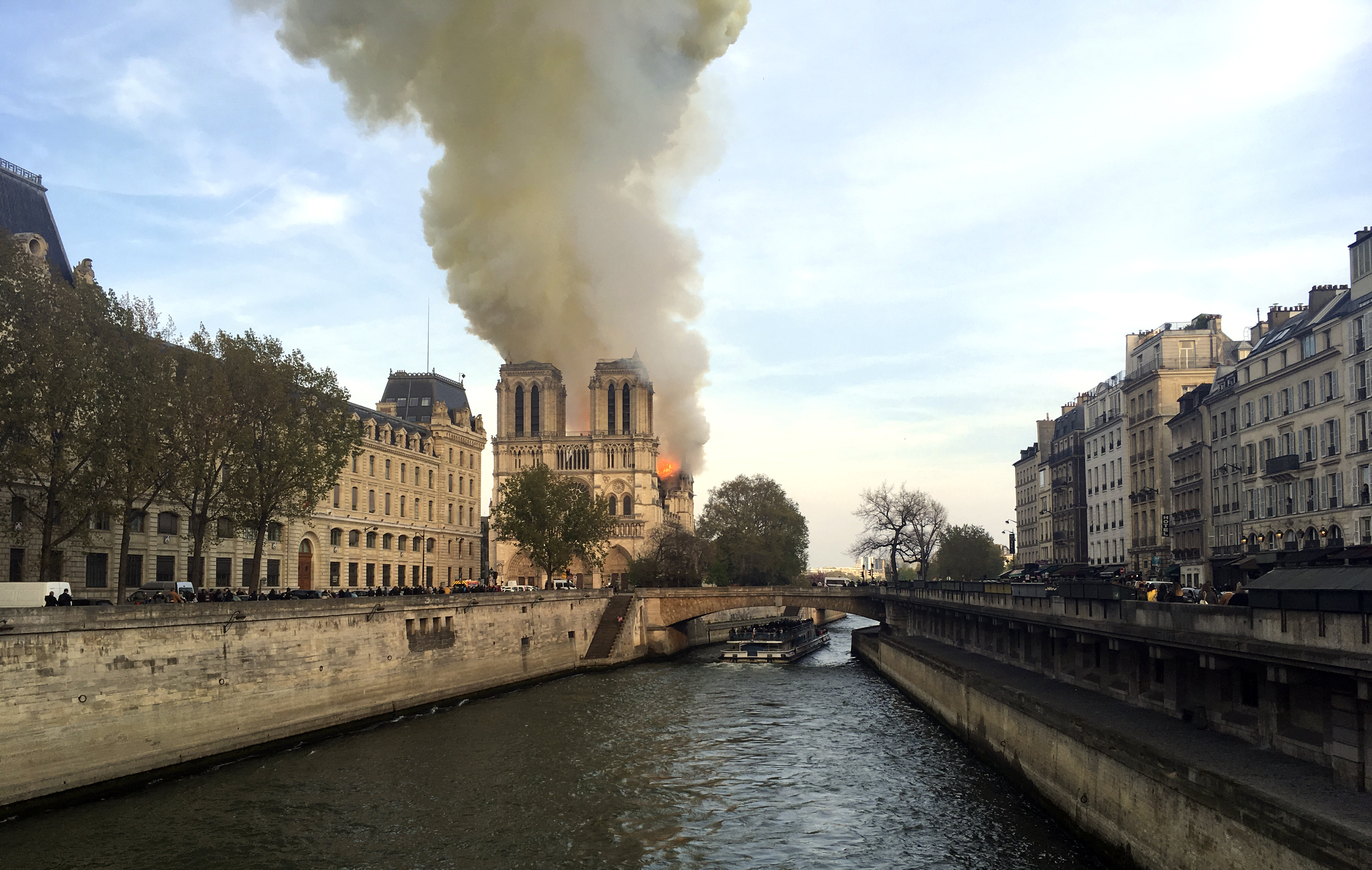 The Latest: American tourists shocked at Notre Dame fire