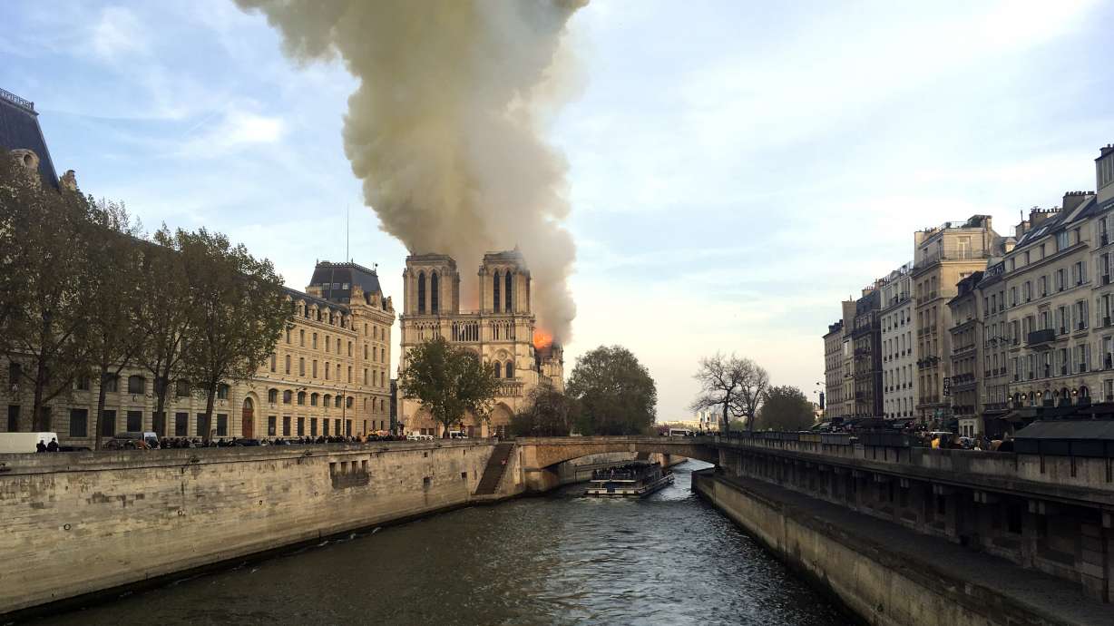 The Latest: American tourists shocked at Notre Dame fire