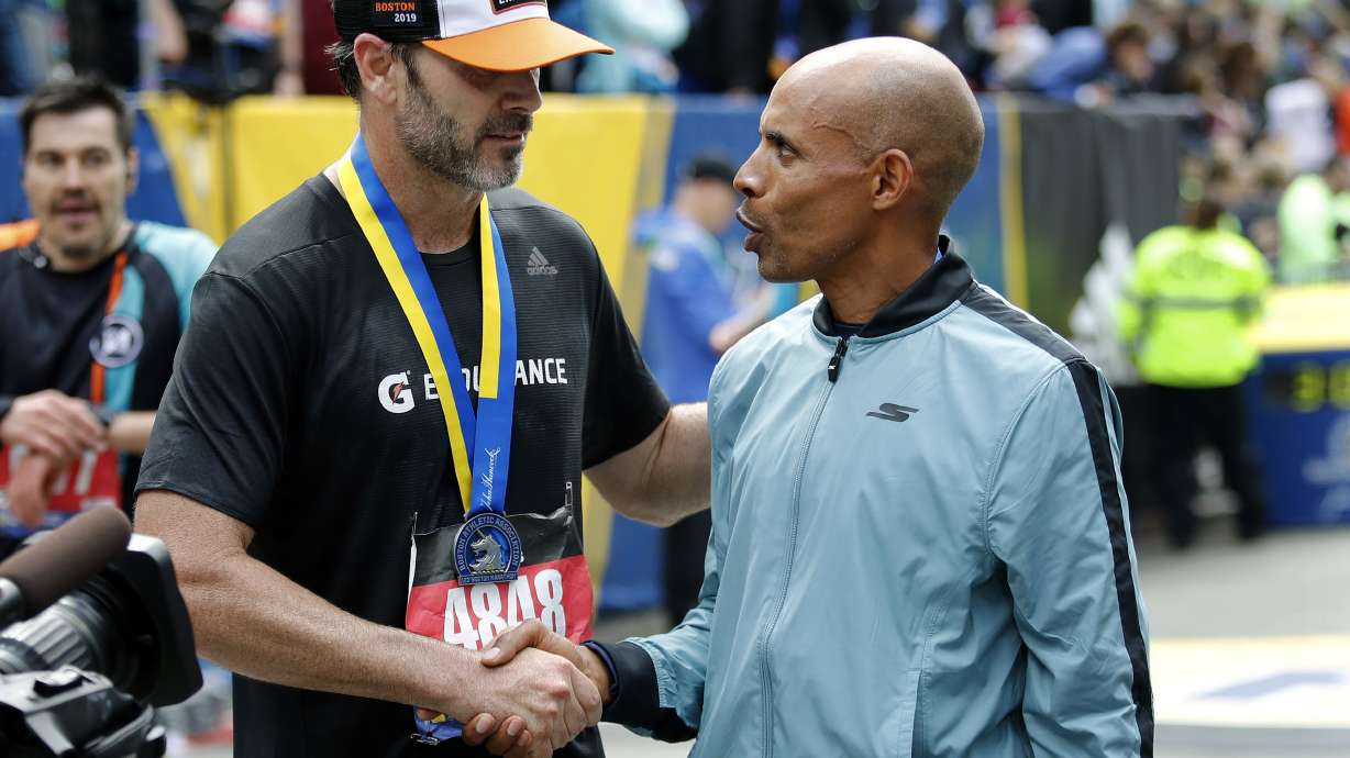NASCAR driver Johnson runs Boston Marathon in 3:09:07