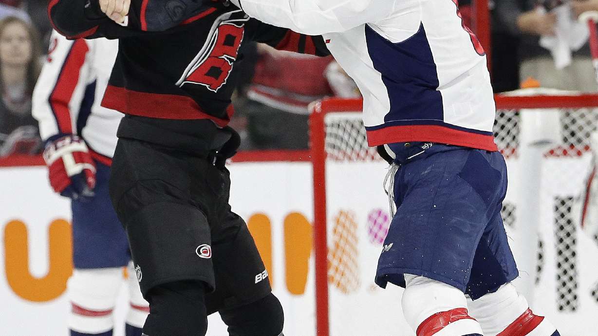 Svechnikov in concussion protocol after fight with Ovechkin