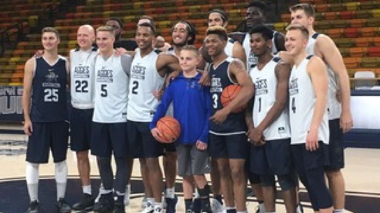 14-year-old boy who is partially paralyzed wows Aggies basketball team