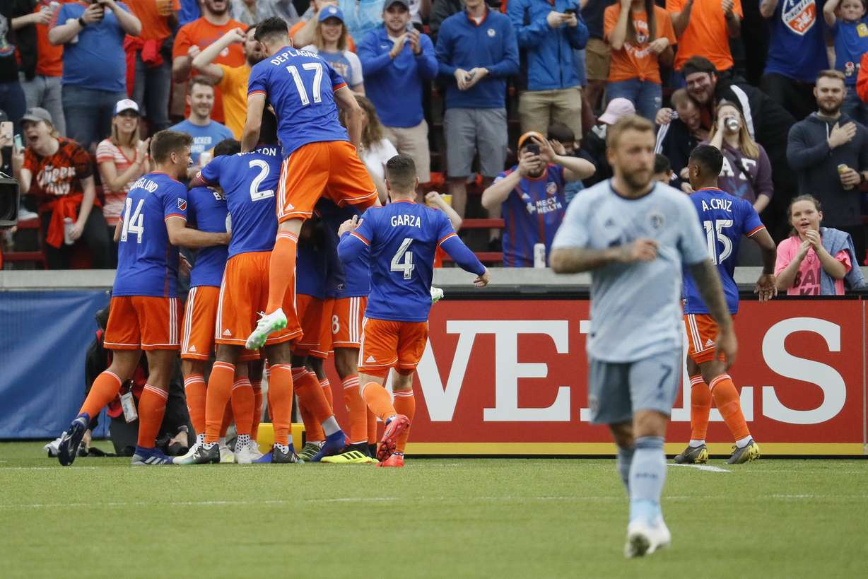 The FC Cincinnati team celebrates after forward Darren Mattocks (11) scores on a free kick in the first half of an MLS soccer match against the Sporting Kansas City, Sunday, April 7, 2019, in Cincinnati. (Photo: John Minchillo, AP)