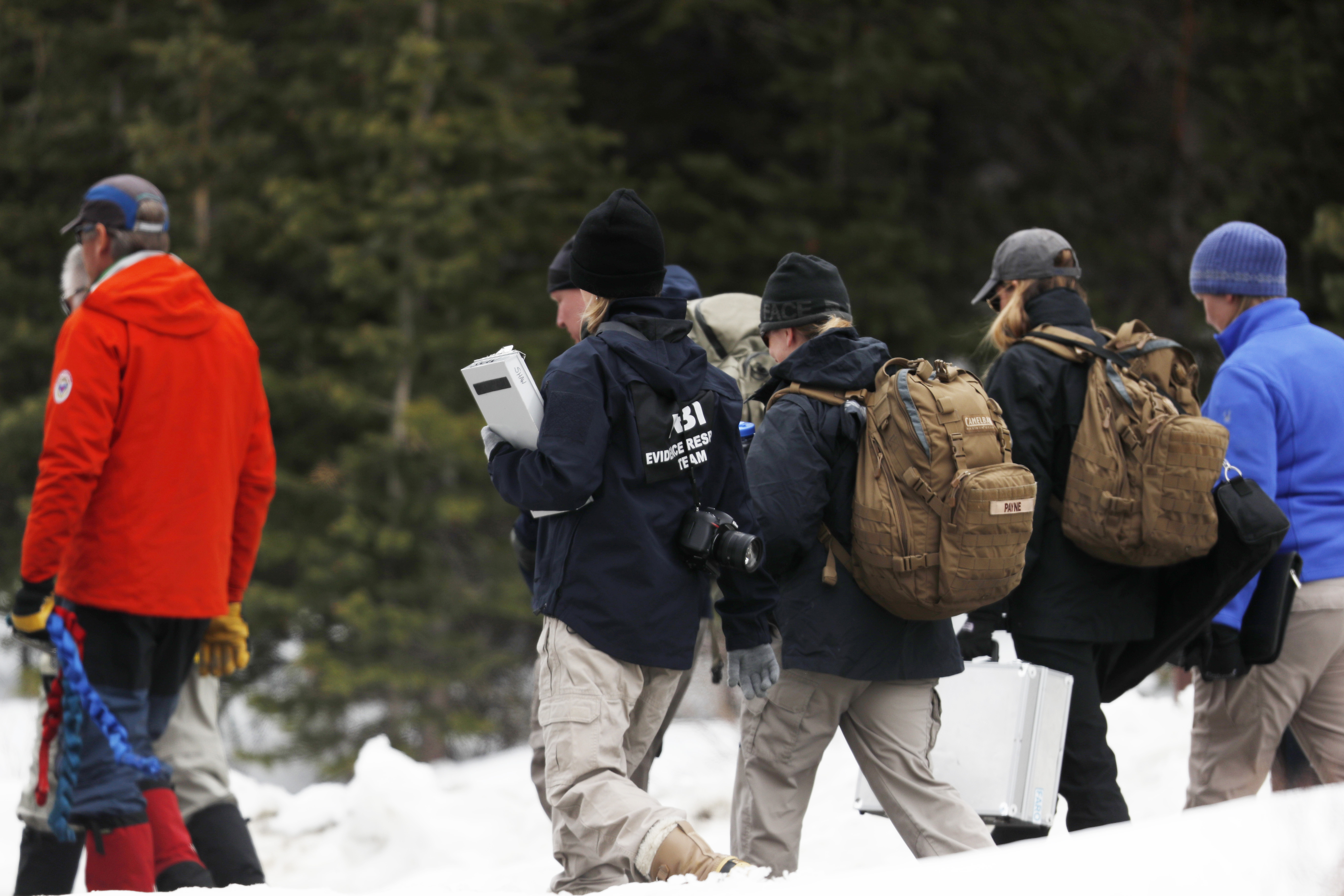 Columbine focuses on healing as questions loom after manhunt