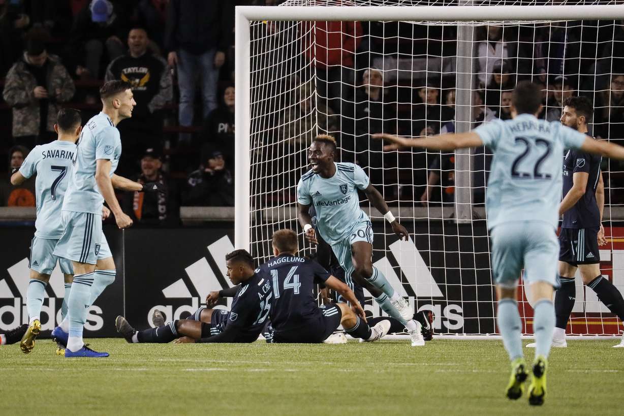 Real Salt Lake forward Sam Johnson, center, celebrates after scoring during the first half of the team's MLS soccer match against FC Cincinnati, Friday, April 19, 2019, in Cincinnati. (Photo: John Minchillo, AP)