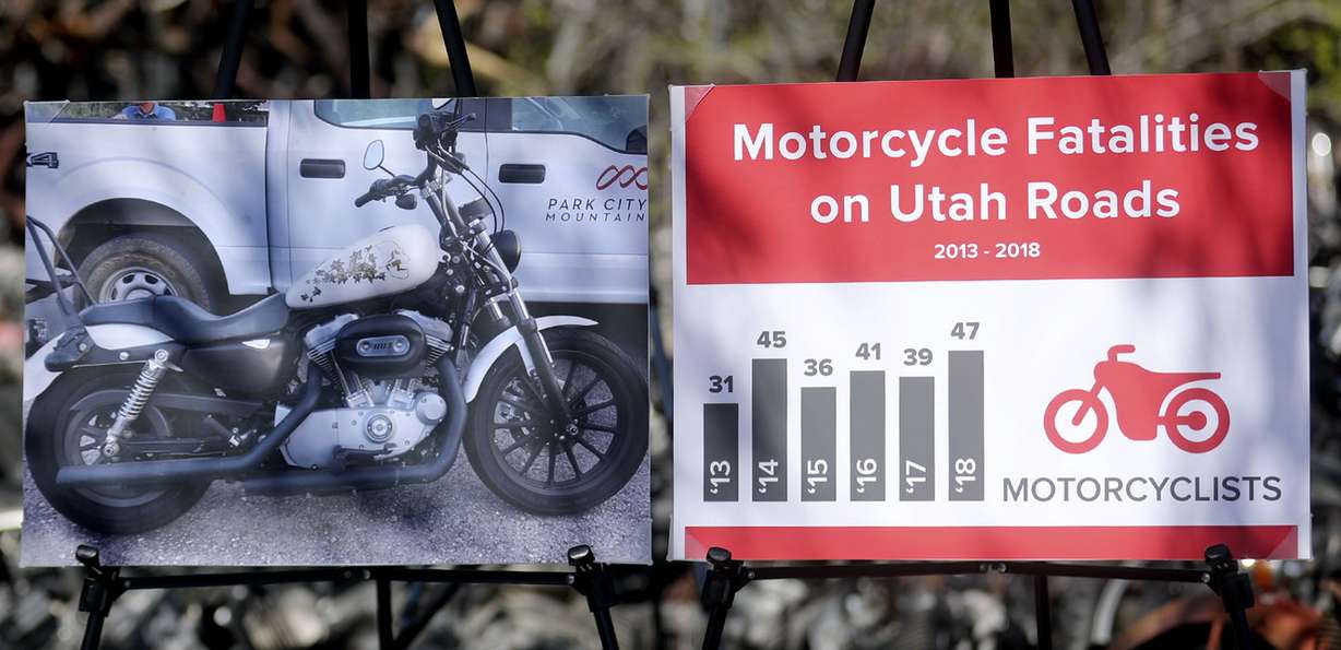 Signs are posted during a press event about motorcycle safety and driver awareness at Bill’s Boneyard in West Valley City on Tuesday, April 23, 2019. Motorcycle fatalities jumped from 38 in 2017 to 47 in 2018. (Photo: Kristin Murphy, KSL)