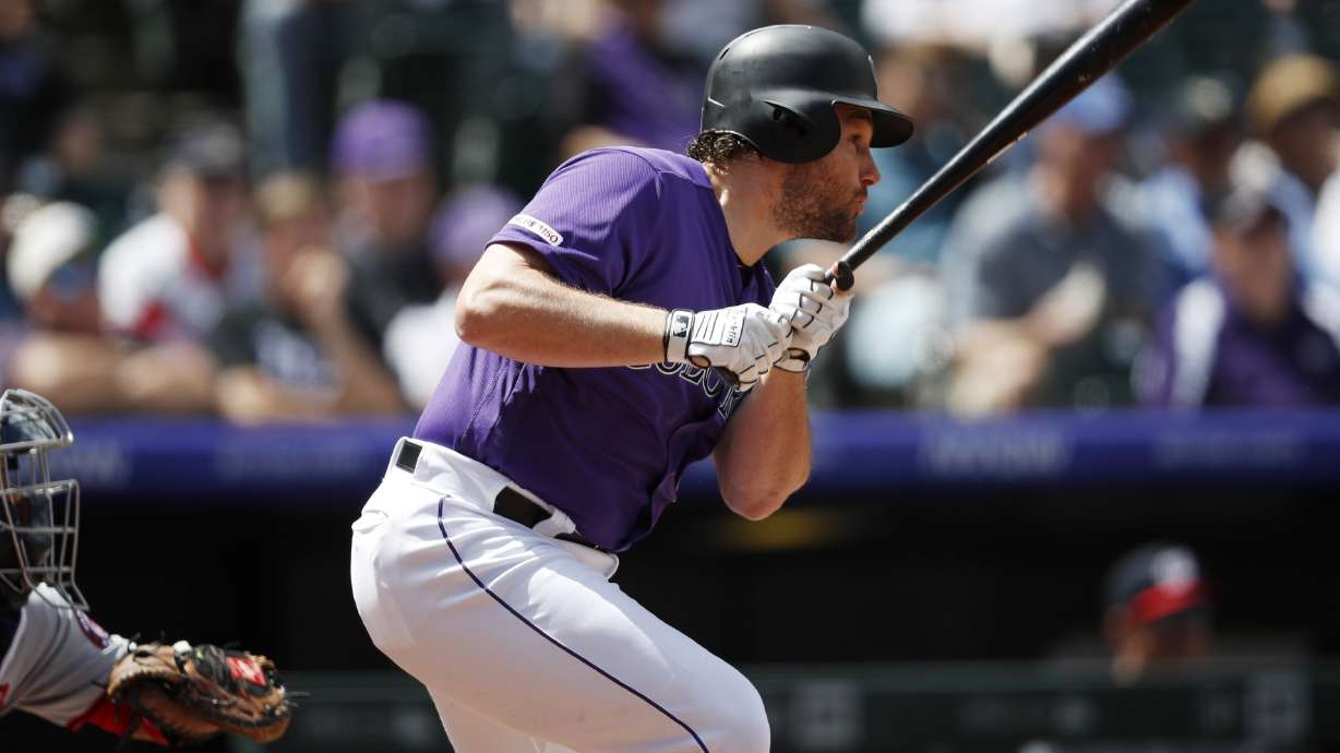 Tapia's 3-run double sparks Rockies over Nats, 9-5