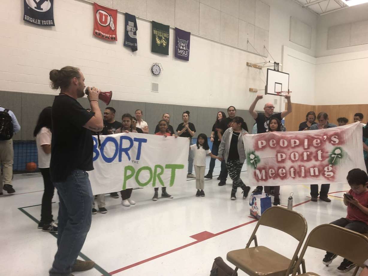 Protestors interrupt the Utah Inland Port Authority's monthly board meeting at North Star Elementary School in Salt Lake City on Wednesday, April 24, 2019. (Photo: Katie McKellar, KSL)